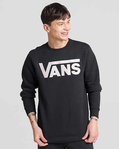 Nada melhor que um clássico original Vans para te aquecer com estilo nas temperaturas mais amenas. Honrando as tradições, o Moletom Vans Classic Crew Ll Black White masculino traz a herança “Off The Wall” para compor um visual despojado e esportivo, com total conforto. O moletom é confeccionado em poliéster e algodão, apresenta gola, punhos e barra canelados. Na cor preta, traz estampa frontal com assinatura Vans em “Drop V”  centralizada na altura do peito, em silk à base d’água e aplicação de etiqueta tecida Vans na lateral. O caimento do moletom é clássico, trazendo leveza e conforto ao vestir. O modelo tem 1,82 e veste tamanho M.