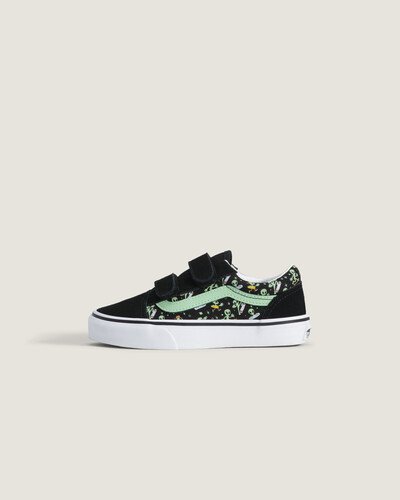 O Tênis Old Skool Kids Glow Cosmic Cruisers Black Green Infantil traz o brilho com estampas alienígenas que brilham no escuro - e uma Sidestripe que ilumina a noite. Com tiras fáceis de prender com velcro e detalhes em camurça resistente, este clássico reformulado foi criado para aventuras cotidianas de outro mundo.
