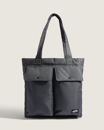 A Bolsa Tote Lawler Asphalt apresenta construção prática com nylon revestido em poliuretano e forro em poliéster. Compacta, com capacidade de 5 litros, tem fechamento por zíper e cordão bungee que garante fechamento rápido e textura tátil ao manuseio. Alça de ombro removível e ajustável e alça para carregar na mão ampliam formas de uso. Ferragens em metal e etiqueta VANS completam o acabamento funcional.