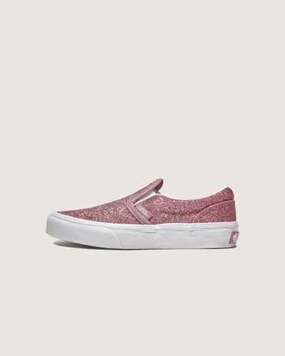 Skate infantil e ícone cultural

O sapato Big Kids Slip-On Glitter é uma versão reduzida do clássico do skate. Oferecendo a mesma gola acolchoada, sola waffle aderente e parte superior sem atacadores, ele traz a personificação do estilo e função sem esforço para a próxima geração.