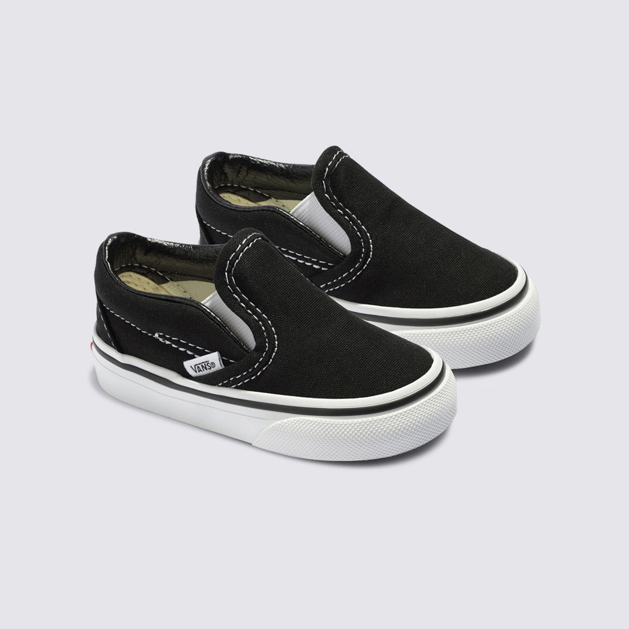 Kids black vans slip ons sales
