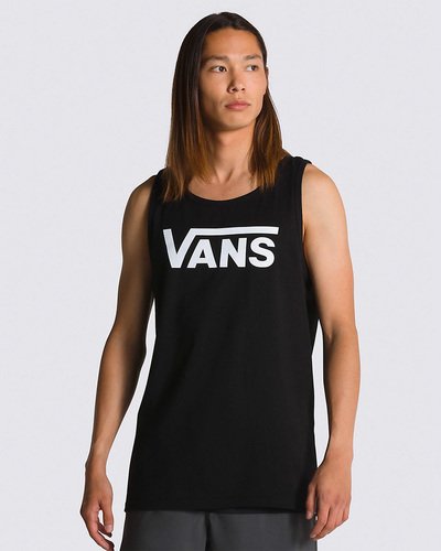 Fundada na Califórnia em 1966, a Vans está envolvida com a cultura de rua, artes, música e ligada ao skate e à evolução do esporte, sem perder a essência. Dos clássicos aos modernos, a Vans possui uma enorme variedade de modelos de tênis, roupas e acessórios, sempre mantendo o estilo "Off The Wall". A Regata Vans Classic Tank Black White possui o logo Vans em "Drop V" estampado na altura do peito e é confeccionada em 100% algodão. Tipo de caimento: clássico. O modelo tem 1,82 e veste tamanho M.