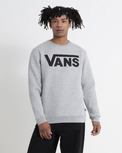Nada melhor que um clássico original Vans para te aquecer com estilo nas temperaturas mais amenas. Honrando as tradições, o Moletom Vans Classic Crew Ll Cement Heather Black masculino traz a herança “Off The Wall” para compor um visual despojado e esportivo, com total conforto. O moletom é confeccionado em poliéster e algodão, apresenta gola, punhos e barra canelados. Na cor cinza, traz estampa frontal com assinatura Vans em “Drop V”  centralizada na altura do peito, em silk à base d’água e aplicação de etiqueta tecida Vans na lateral. O caimento do moletom é clássico, trazendo leveza e conforto ao vestir. O modelo tem 1,82 e veste tamanho M.