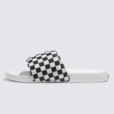 Deslize no conforto com o Chinelo Slide-On La Costa Slide On Checkerboard Black Marshmallow. Com inspiração no solado vulcanizado dos clássicos Vans, o chinelo slide-on apresenta silhueta com uma tira larga em nobuck sintético com estampa icônica em checkerboard. Com forro de borracha macia e tecido elástico, o modelo possui palmilhas UltraCush super macias que incluem suporte de arco embutido e as solas waffle UltraCush™ Lite injetadas com leveza, flexibilidade e durabilidade. Esse modelo vai te acompanhar na correria de um dia inteiro. O logo “Vans Off The Wall” é aplicado na heeltab do calcanhar.