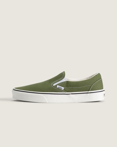 O Tênis Slip-On Duck Canvas Green Balsam nasceu em 1977 como Vans #98 e rapidamente virou ícone da Vans por sua praticidade e design descomplicado. Este modelo traz construção vulcanizada em lona resistente, combinando flexibilidade e suporte para conforto imediato. Forro acolchoado e materiais têxteis de origem vegetal reforçam a sensação de leveza, enquanto o fechamento slip-on garante uso ágil, alinhado ao legado criativo e descontraído da marca