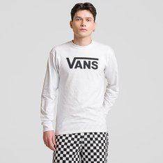 Fundada na Califórnia em 1966, a Vans está envolvida com a cultura de rua, artes, música e ligada ao skate e à evolução do esporte, sem perder a essência. Dos clássicos aos modernos, a Vans possui uma enorme variedade de modelos de tênis, roupas e acessórios, sempre mantendo o estilo "Off The Wall". A Camiseta Vans Classic White Black de manga longa possui o logo Vans em "Drop V" estampado na altura do peito em silk à base d’água. O modelo apresenta gola e punhos canelados, costura reforçada nos ombros e é confeccionada em 90% algodão e 10% poliéster. Tipo de caimento: clássico. O modelo tem 1,82m de altura e veste tamanho M.