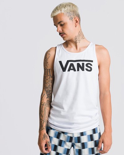 Fundada na Califórnia em 1966, a Vans está envolvida com a cultura de rua, artes, música e ligada ao skate e à evolução do esporte, sem perder a essência. Dos clássicos aos modernos, a Vans possui uma enorme variedade de modelos de tênis, roupas e acessórios, sempre mantendo o estilo "Off The Wall". A Regata Vans Classic Tank White Black possui o logo Vans em "Drop V" estampado na altura do peito e é confeccionada em 100% algodão. Tipo de caimento: clássico. O modelo tem 1,82 e veste tamanho M.