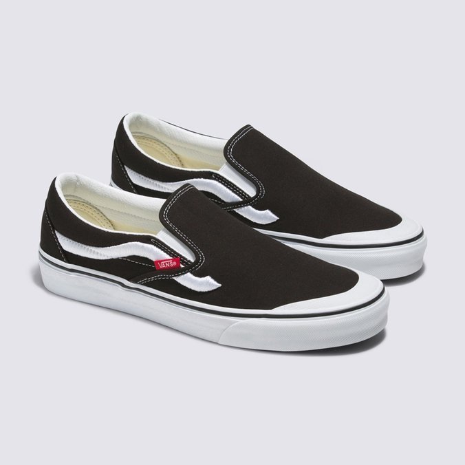 Vans slip on preto e branco hot sale